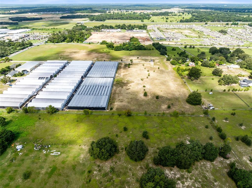 2719 West Kelly Park Road Apopka, FL 32712 - Photo 12 of 22 a view of an swimming pool and an outdoor space