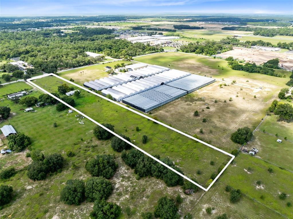 2719 West Kelly Park Road Apopka, FL 32712 - Photo 14 of 22 a view of a tennis court