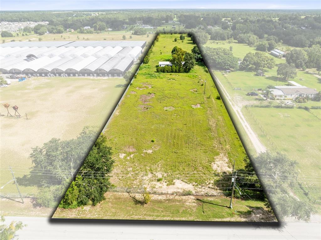 2719 West Kelly Park Road Apopka, FL 32712 - Photo 2 of 22 a view of swimming pool from a yard