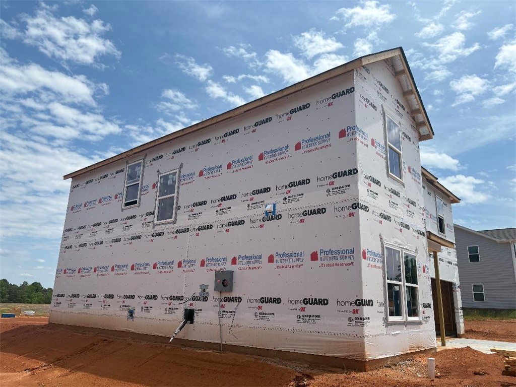 131 Cedar Shoals Easley, SC 29640 - Photo 4 of 8 This new construction is clad in protective house wrap, awaiting its exterior finishes.