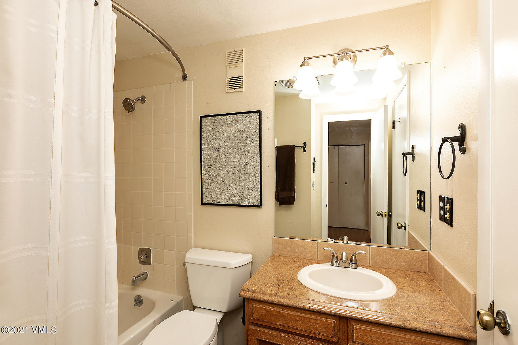 165 Gopher Road, Unit E24 Avon, CO 81620 - Photo 8 of 12 a bathroom with a sink toilet and shower