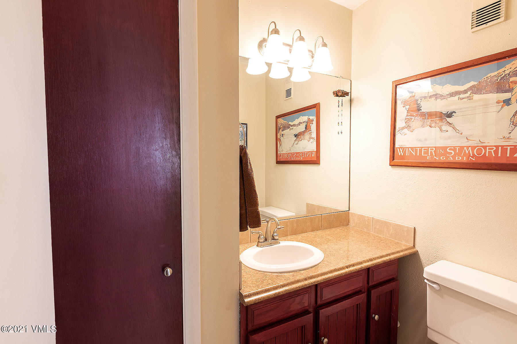 165 Gopher Road, Unit E24 Avon, CO 81620 - Photo 9 of 12 a bathroom with a sink and a mirror
