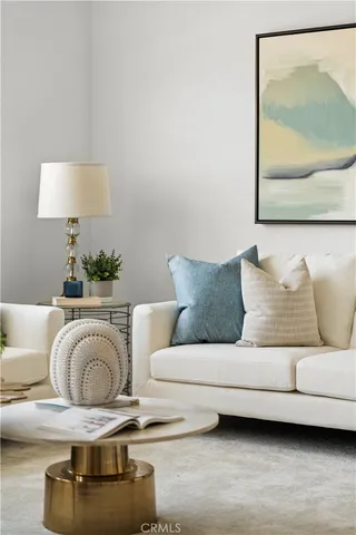 a living room with furniture and a couch