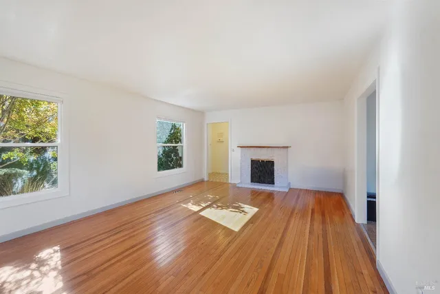 a kitchen with stainless steel appliances a refrigerator sink and cabinets