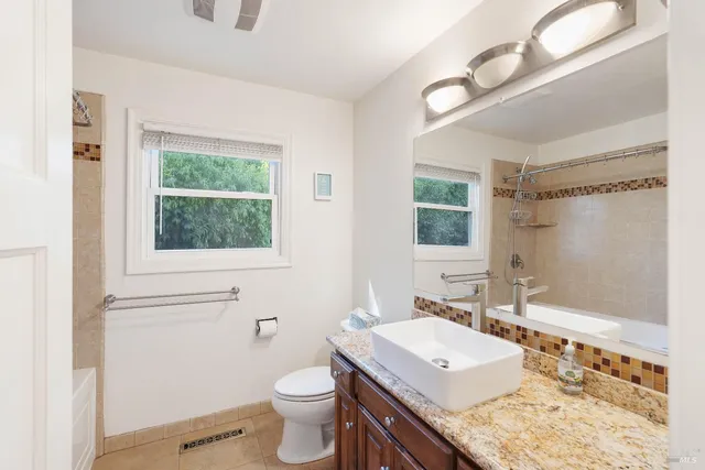 a bathroom with a sink and a toilet