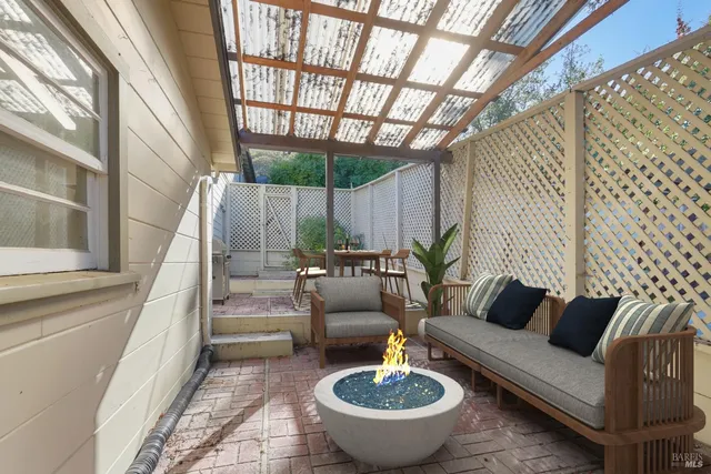 a view of an empty room and glass door