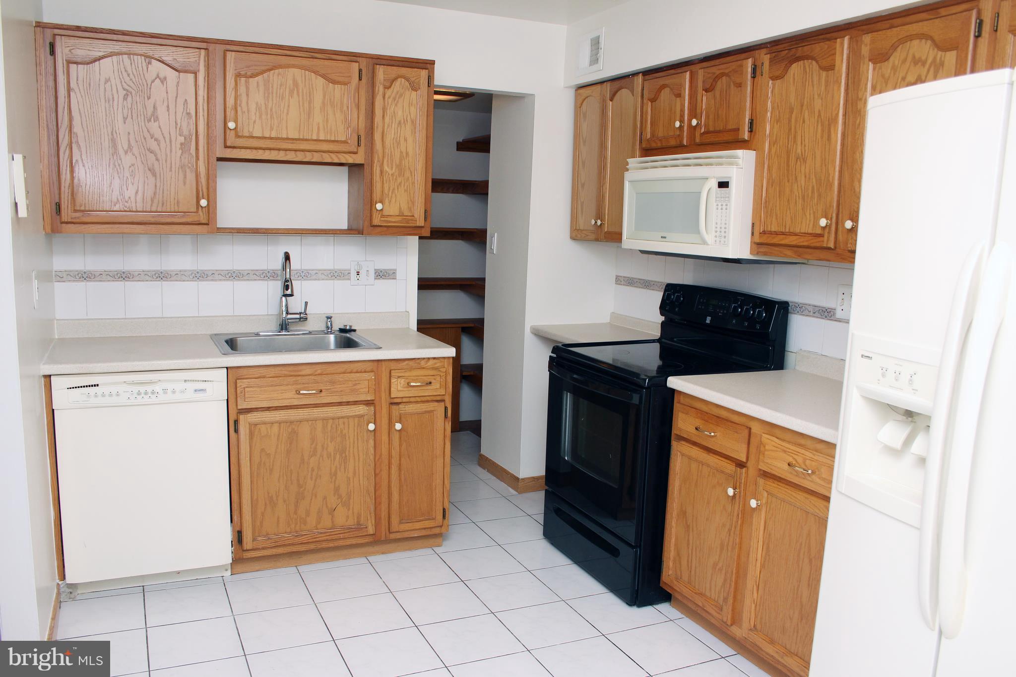 8807 Arliss Street Silver Spring, MD 20901 - Photo 12 of 30 Kitchen