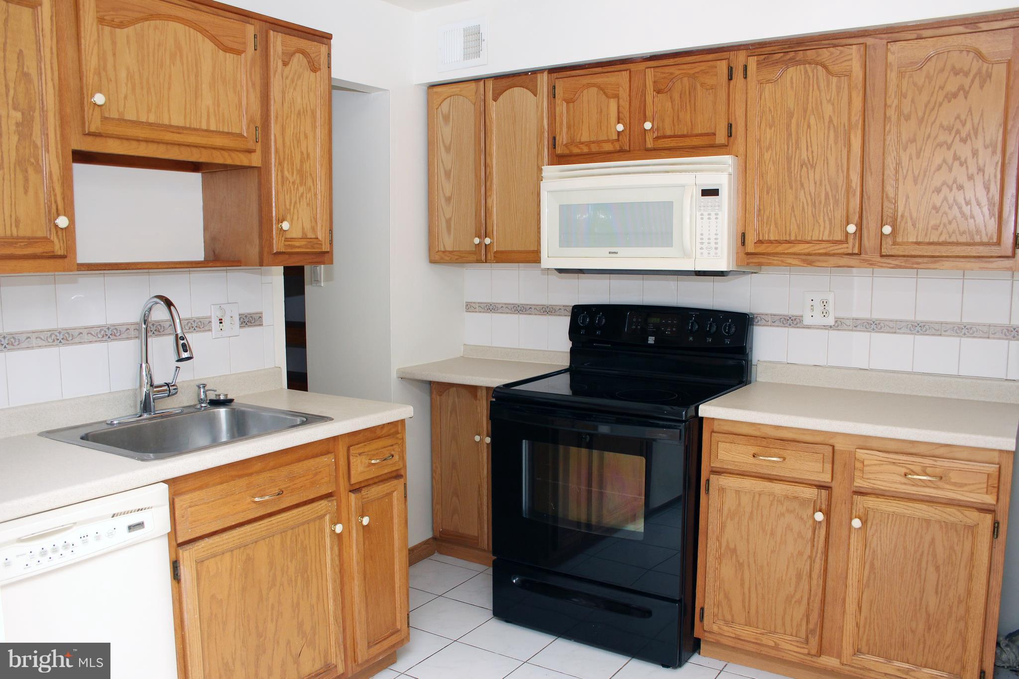 8807 Arliss Street Silver Spring, MD 20901 - Photo 8 of 30 Kitchen