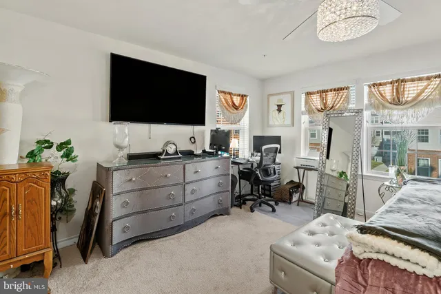 a room with furniture and a flat screen tv