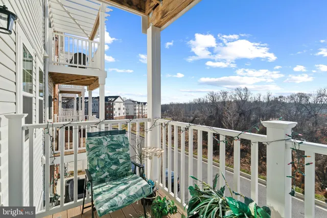 a view of a brick house with a large windows