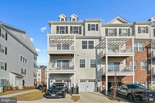 a front view of a building with many windows