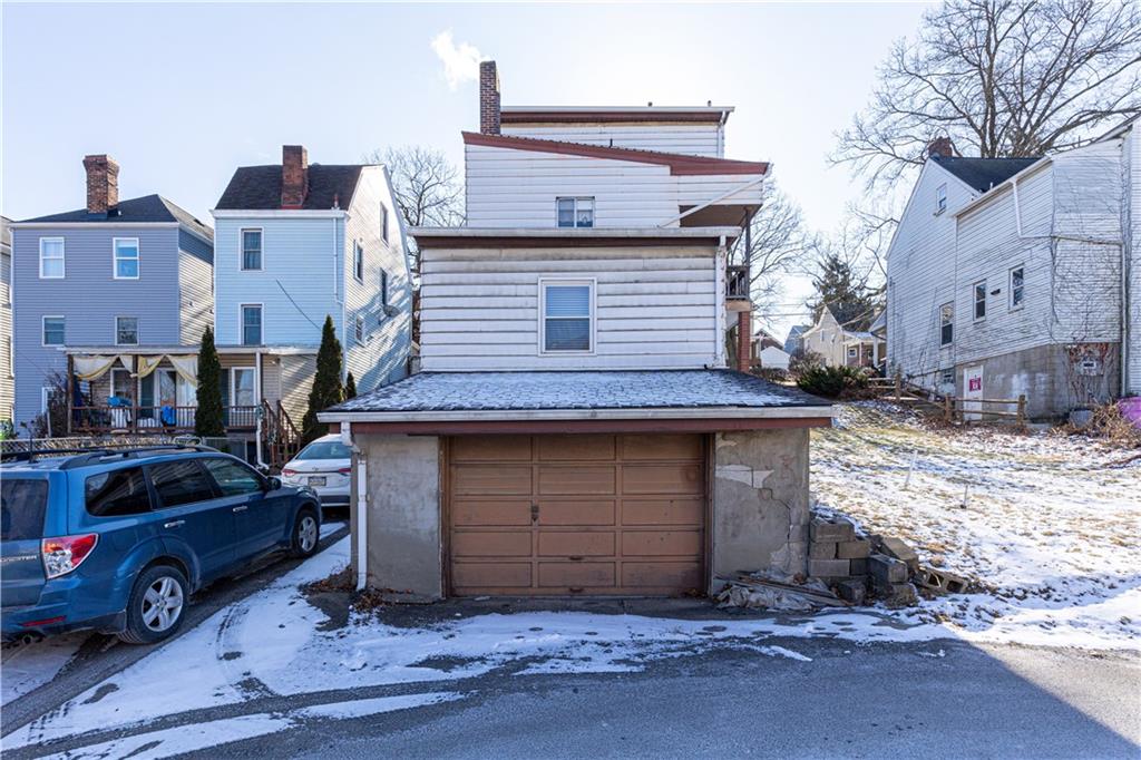 659 Montclair Street Pittsburgh, PA 15217 - Photo 6 of 18 a front view of a house with parking space