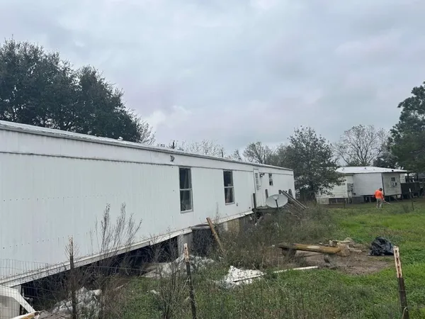 a view of a back yard of the house