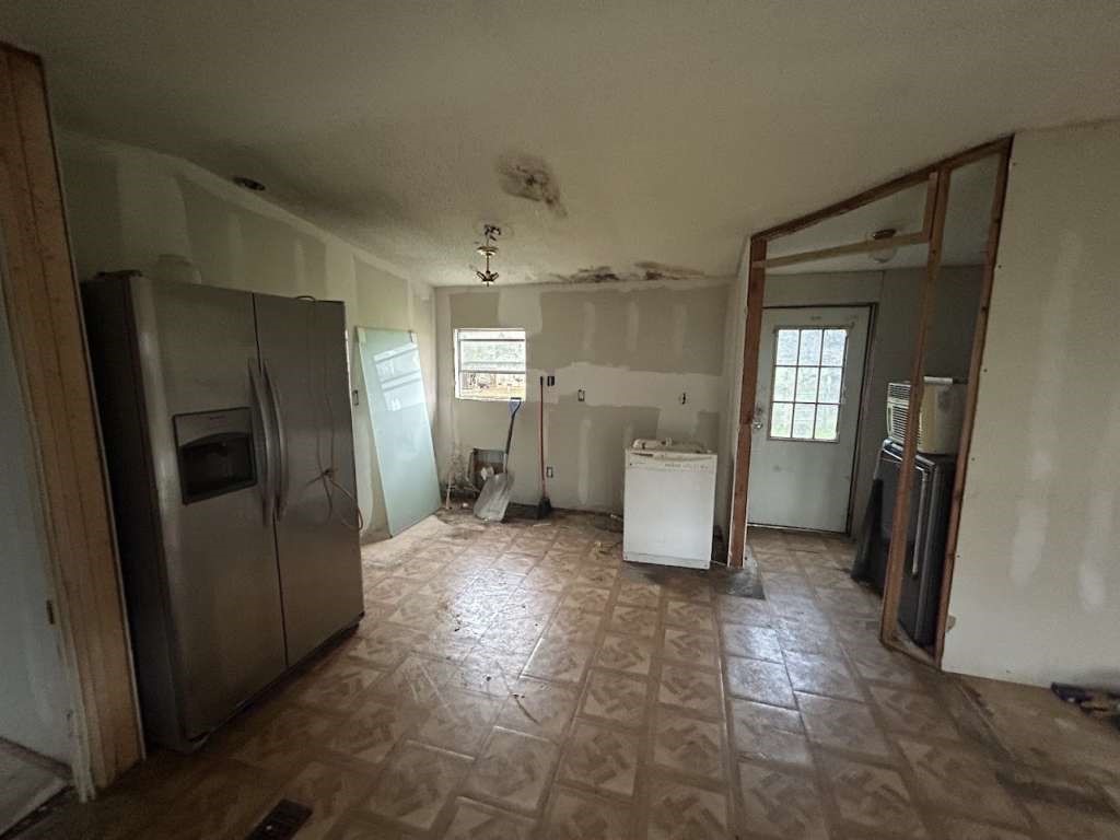 6430 Brockstein Road Sealy, TX 77474 - Photo 4 of 7 a view of a refrigerator and yard in a house