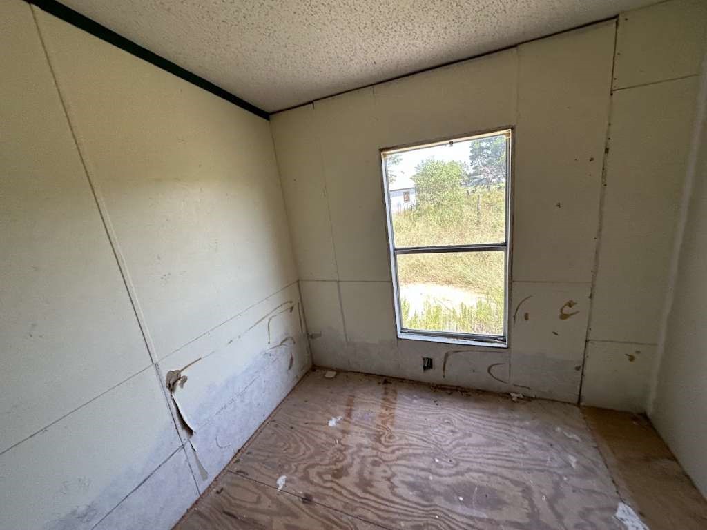 6430 Brockstein Road Sealy, TX 77474 - Photo 5 of 7 a view of an empty room with a window