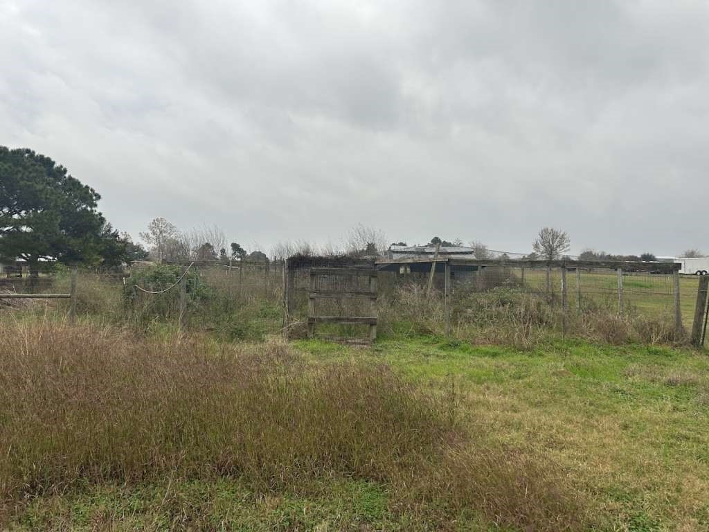 6430 Brockstein Road Sealy, TX 77474 - Photo 7 of 7 a view of a lake with houses in the back
