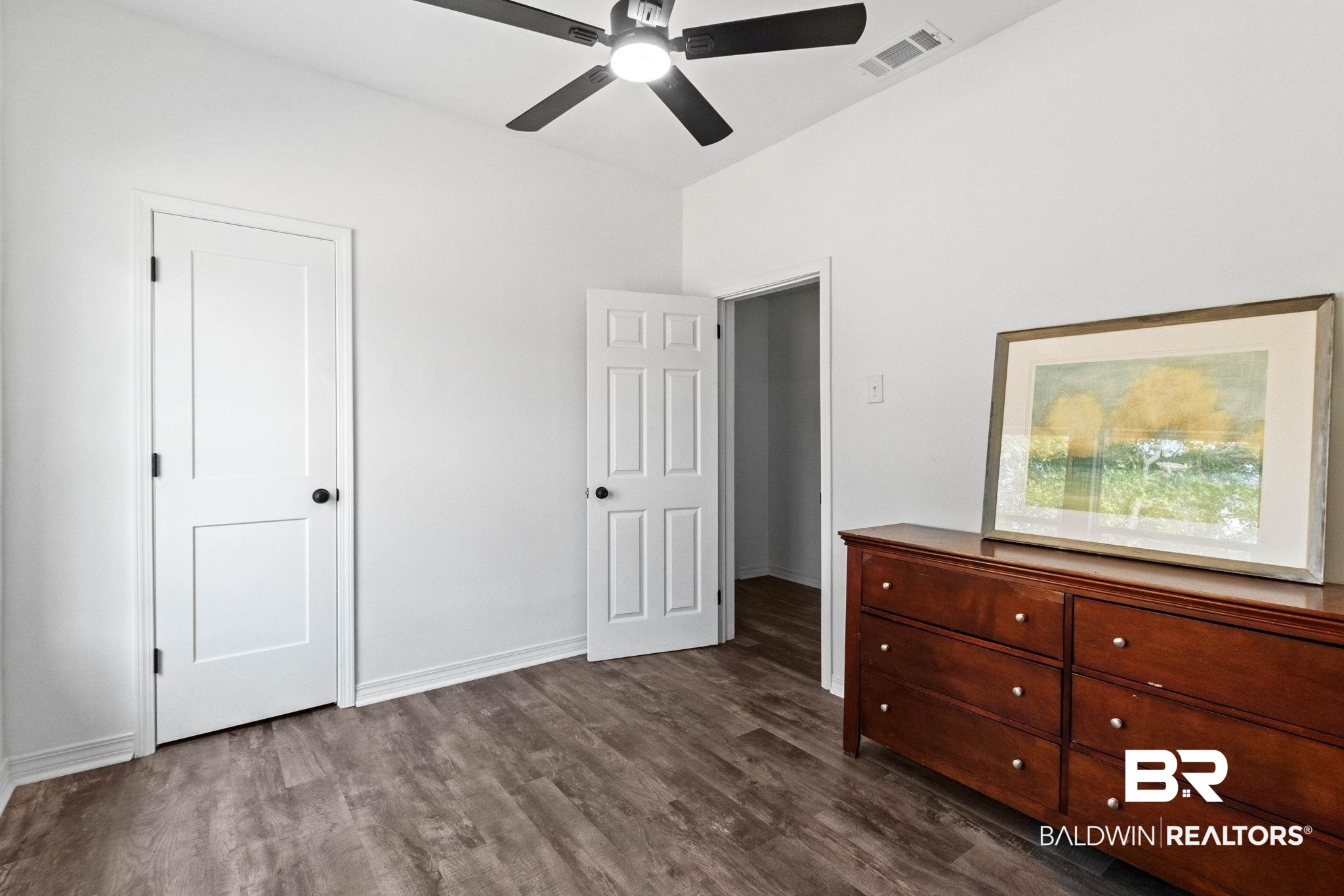 128 Bush Avenue Mobile, AL 36604 - Photo 27 of 40 Bedroom featuring dark wood finished floors and ceiling fan
