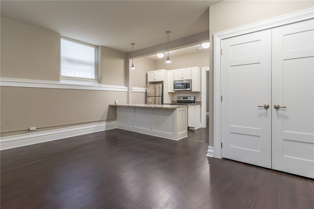 300 Alexander Street, Unit 110 Rochester, NY 14607 - Photo 2 of 14 Apartment 110 view of modern kitchen with breakfas