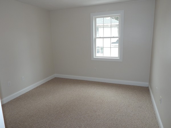 80 Locust Street Brockton, MA 02301 - Photo 16 of 20 an empty room with a window