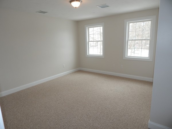 80 Locust Street Brockton, MA 02301 - Photo 17 of 20 an empty room with windows