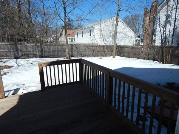 80 Locust Street Brockton, MA 02301 - Photo 19 of 20 a view of a backyard with a deck