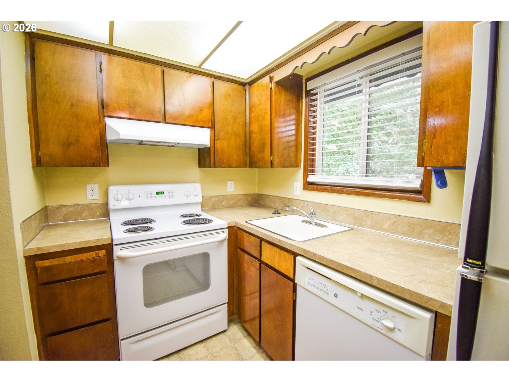 3124 19th Place Forest Grove, OR 97116 - Photo 15 of 31 a view of a kitchen with a stove top oven