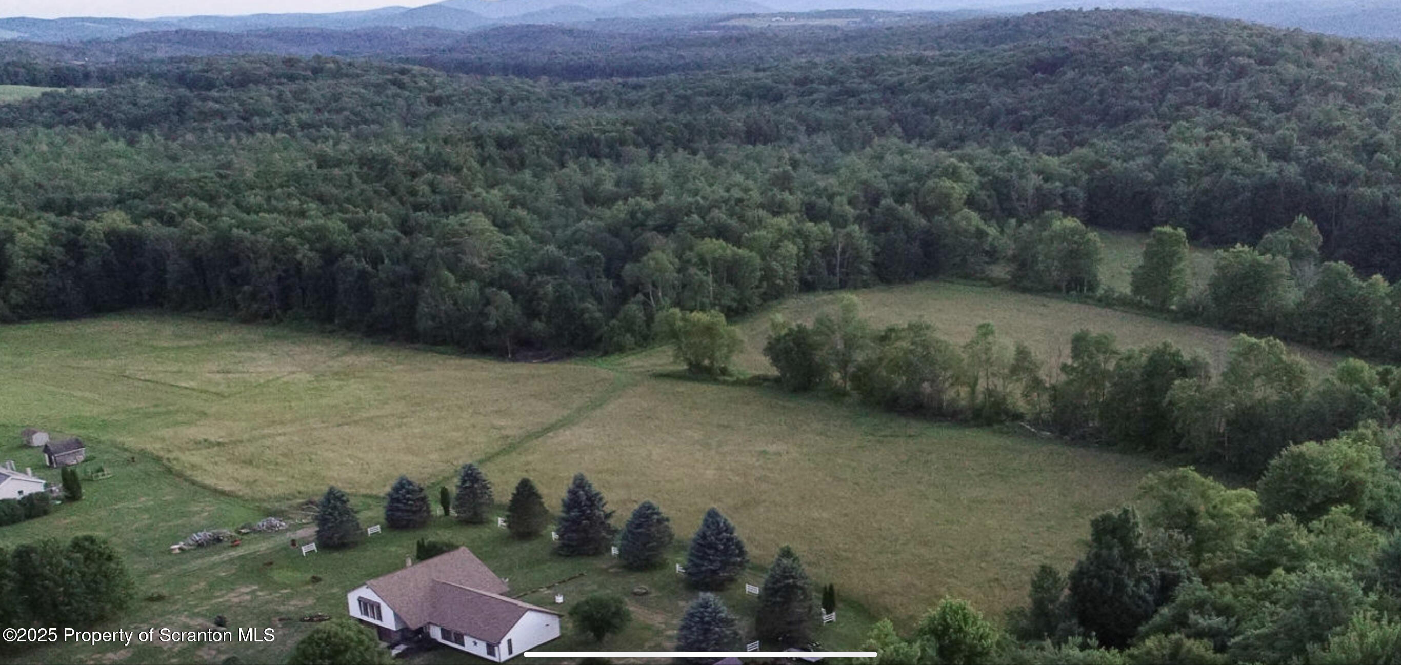 24 Duda Circle Nicholson, PA 18446 - Photo 3 of 6 an aerial view of a house with a yard