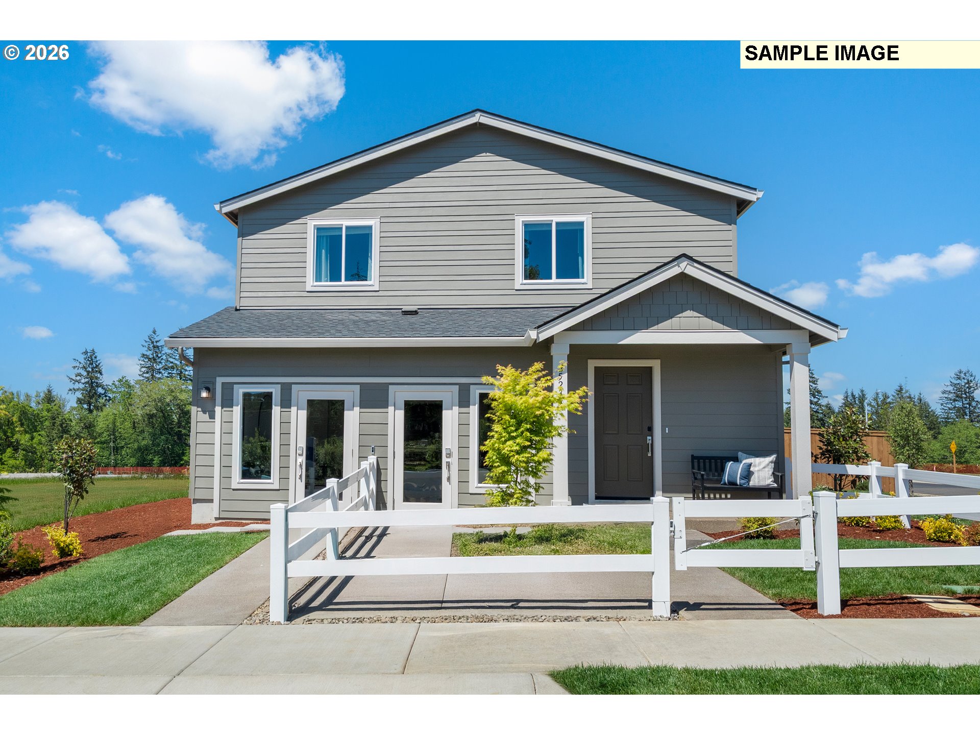 5754 Bainbridge Road Eugene, OR 97402 - Photo 3 of 29 a front view of a house with a yard