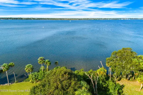 a view of a city with an ocean
