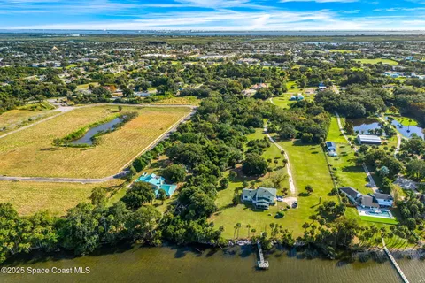 a view of city with ocean