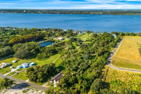 a view of an ocean and a mountain