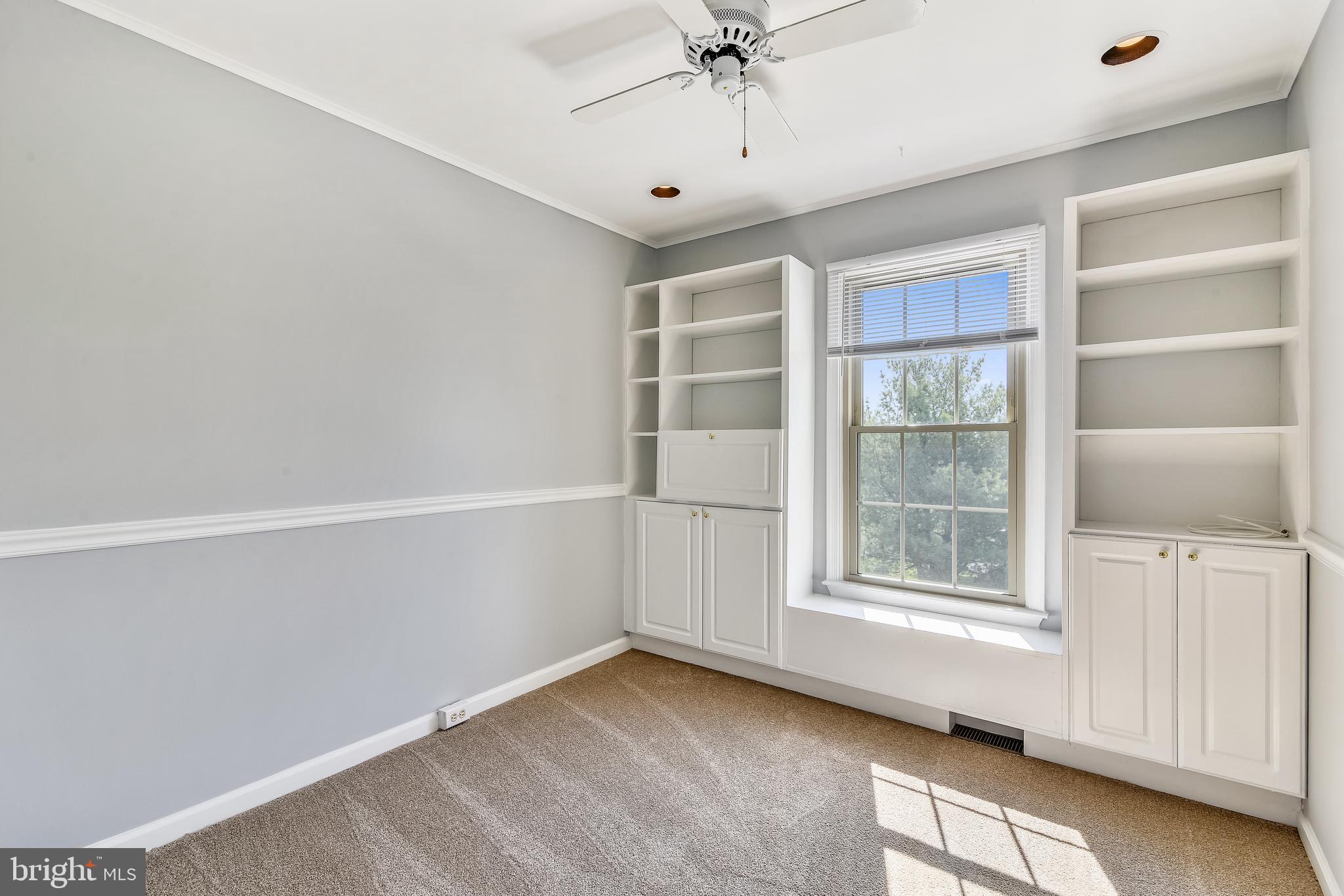 46826 Rabbitrun Terrace Sterling, VA 20164 - Photo 22 of 35 Bedroom 3 with Built in Cabinets and shelving