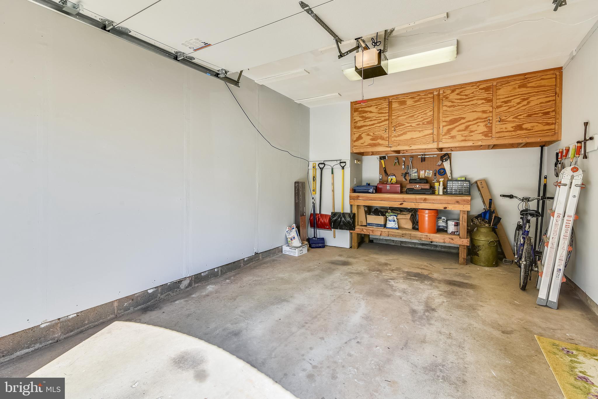 46826 Rabbitrun Terrace Sterling, VA 20164 - Photo 30 of 35 Garage with work bench