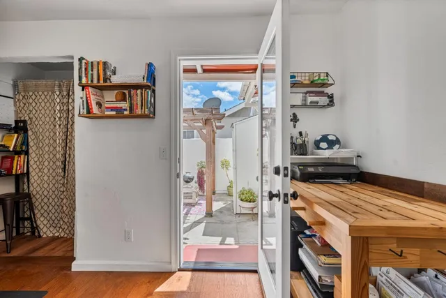 a kitchen with stainless steel appliances a stove and a refrigerator