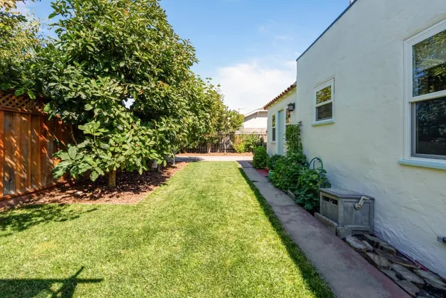 a backyard of a house with seating space