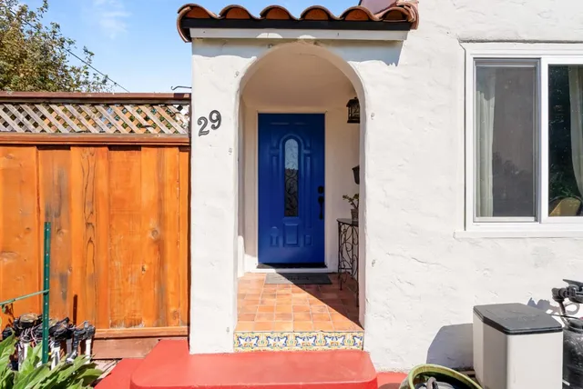 a view of a entryway door of the house and front of a house