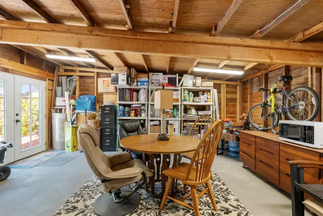 a view of a house with a tree