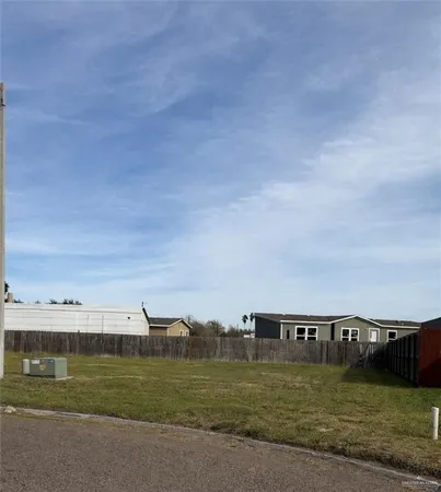 a view of a field with a big yard