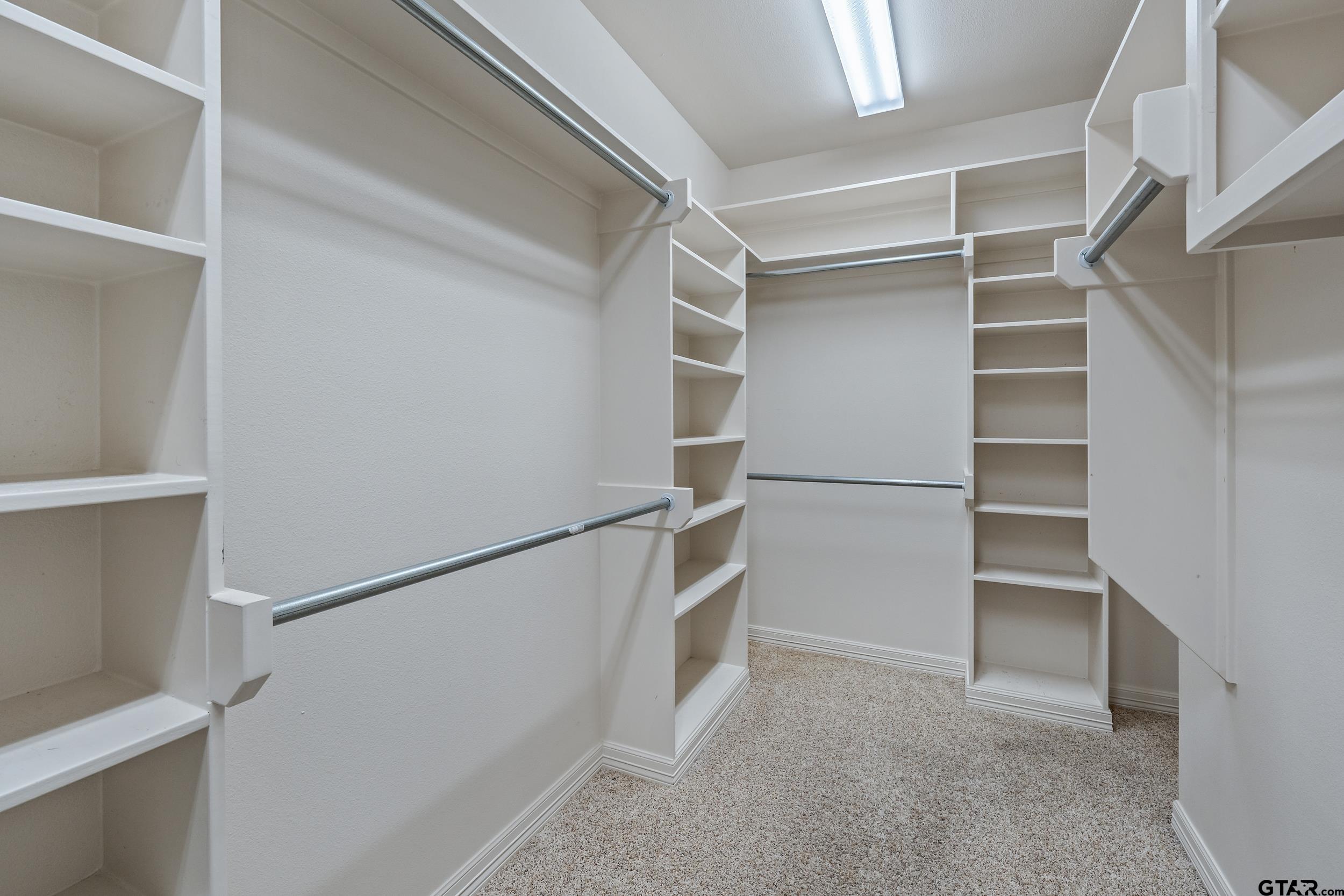 5524 Hollytree Drive Tyler, TX 75703 - Photo 18 of 27 a view of an empty walk in closet