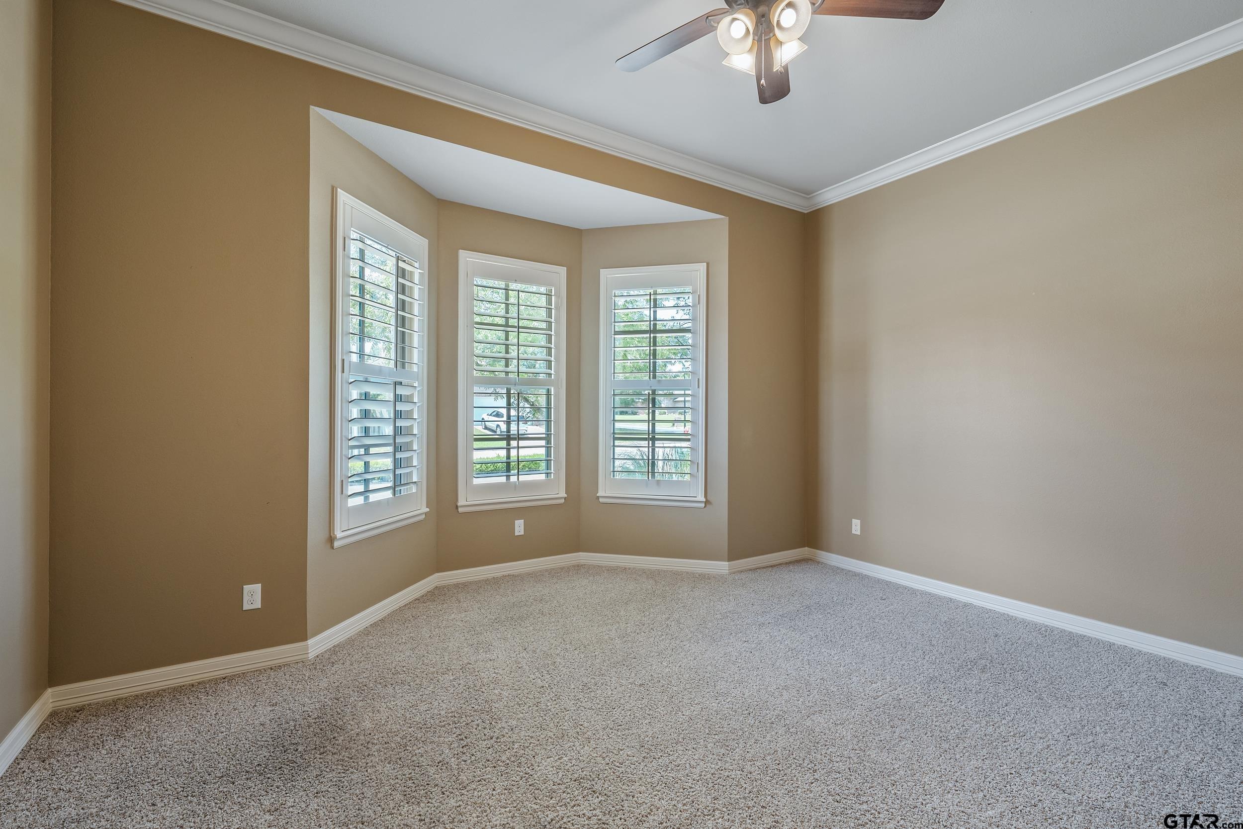 5524 Hollytree Drive Tyler, TX 75703 - Photo 19 of 27 a view of an empty room with a window