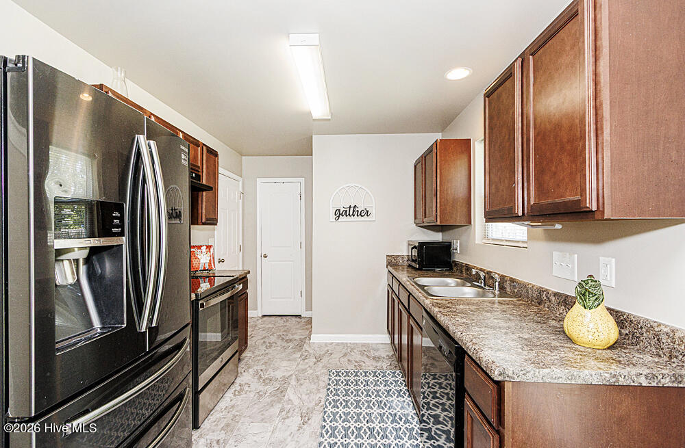 811 Sugar Creek Road Rocky Mount, NC 27804 - Photo 3 of 19 New flooring, pantry!