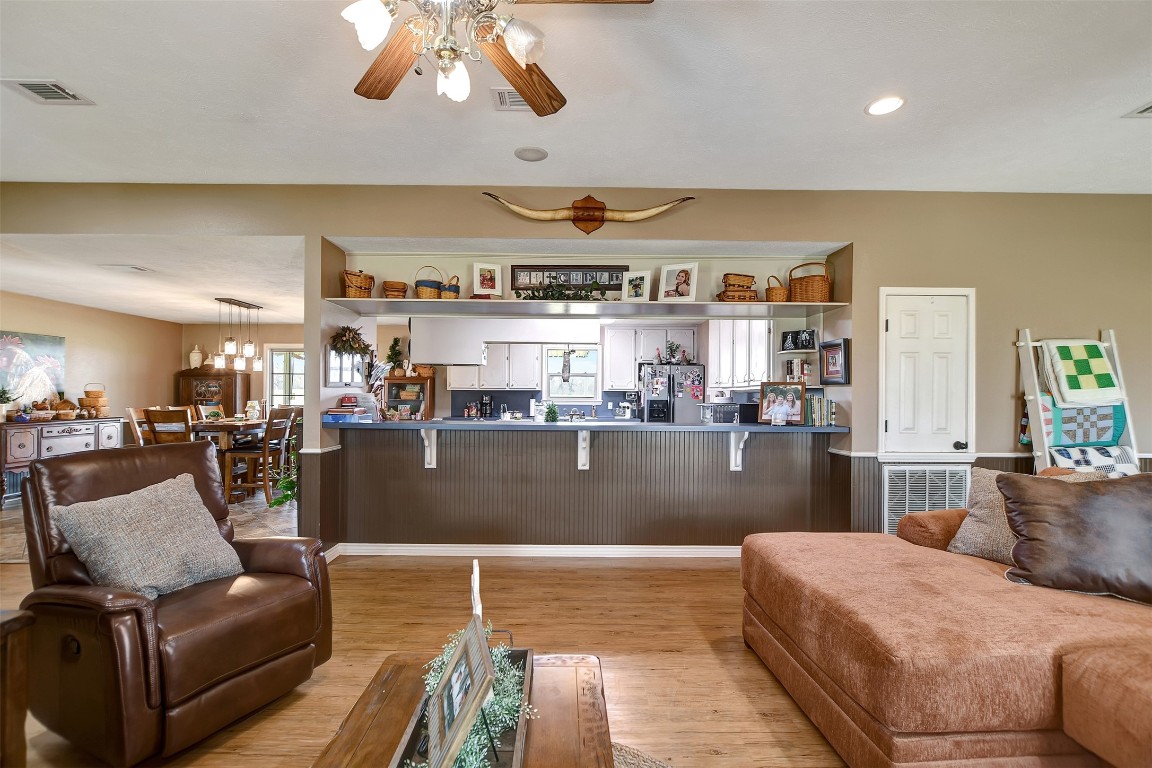 599 County Road 295 Garrison, TX 75946 - Photo 11 of 50 a living room with furniture and a flat screen tv