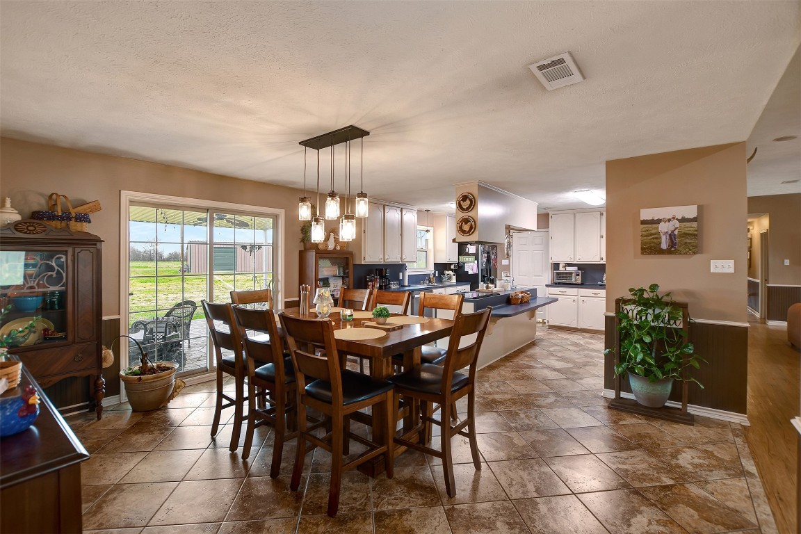 599 County Road 295 Garrison, TX 75946 - Photo 17 of 50 a view of a dining room with furniture