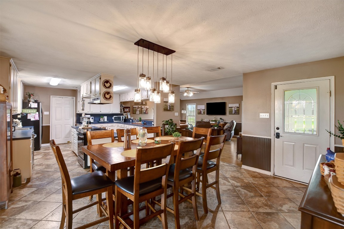 599 County Road 295 Garrison, TX 75946 - Photo 18 of 50 a view of a dining room with furniture