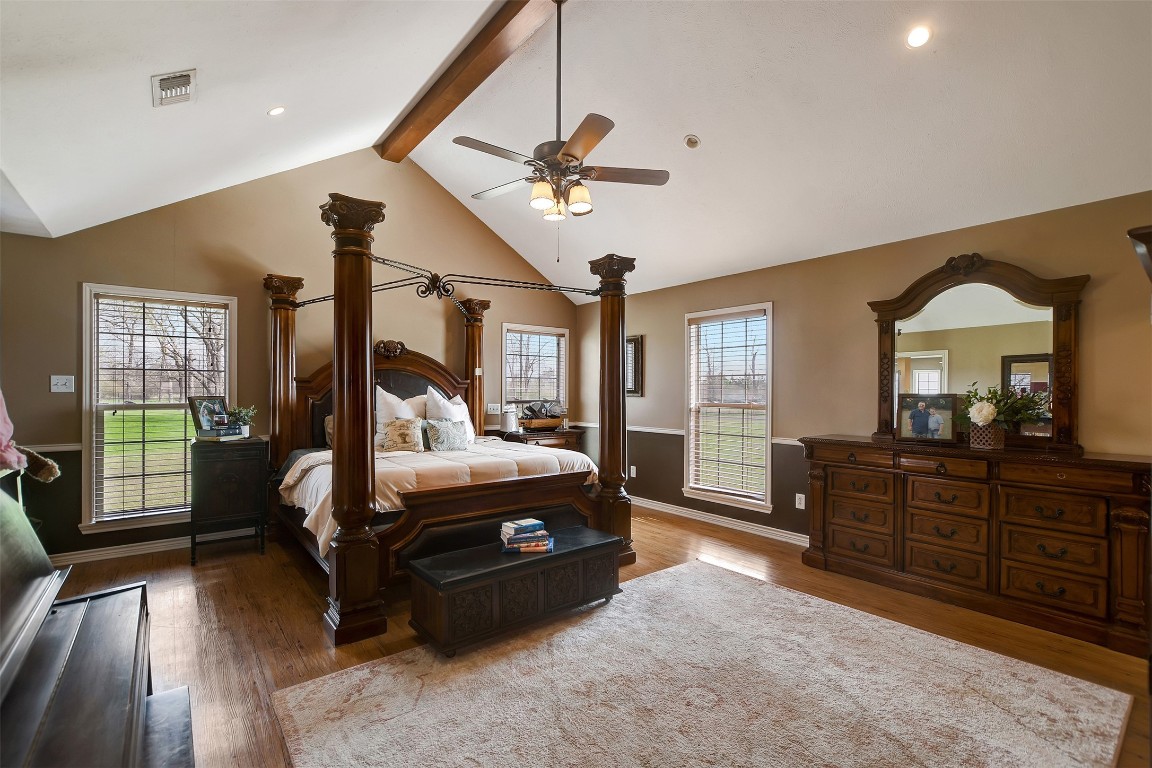 599 County Road 295 Garrison, TX 75946 - Photo 19 of 50 a bedroom with a bed and a mirror on the dresser