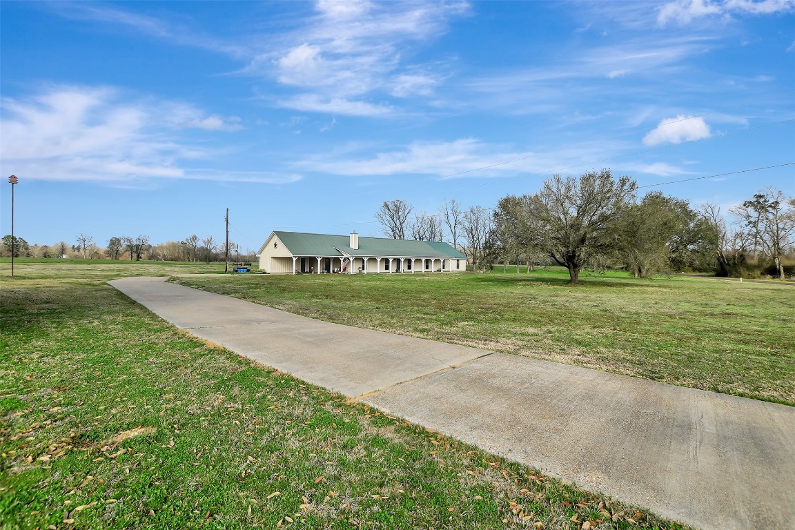 599 County Road 295 Garrison, TX 75946 - Photo 2 of 50 a view of a field with an ocean
