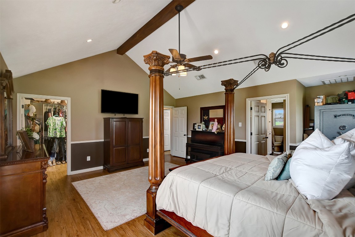 599 County Road 295 Garrison, TX 75946 - Photo 21 of 50 a bedroom with a bed a flat screen tv and dresser