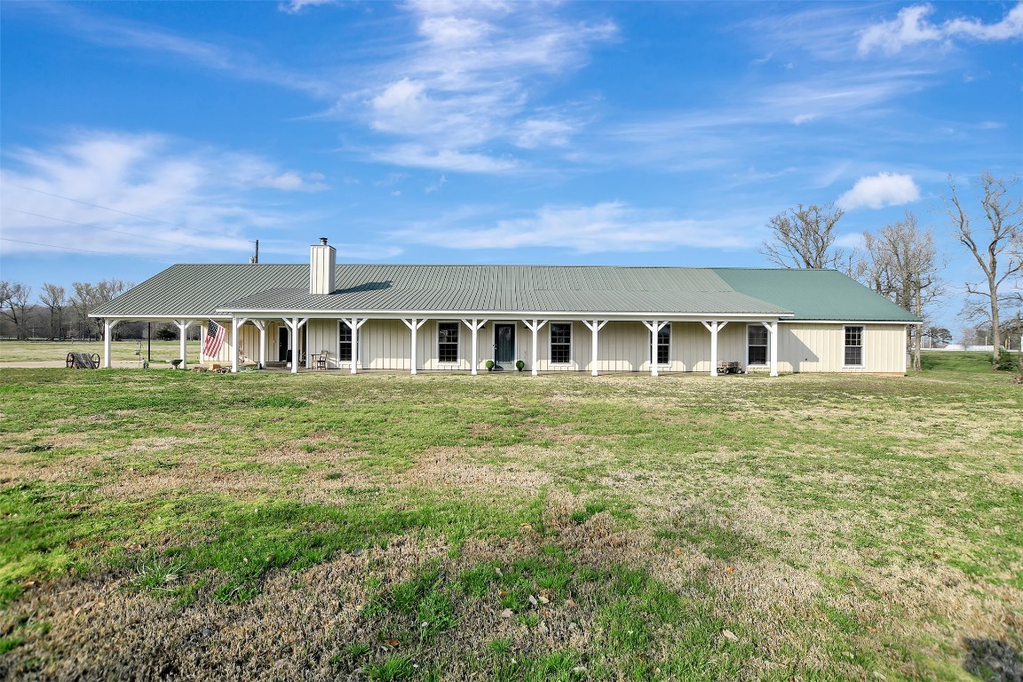 599 County Road 295 Garrison, TX 75946 - Photo 3 of 50 a front view of a house with a yard