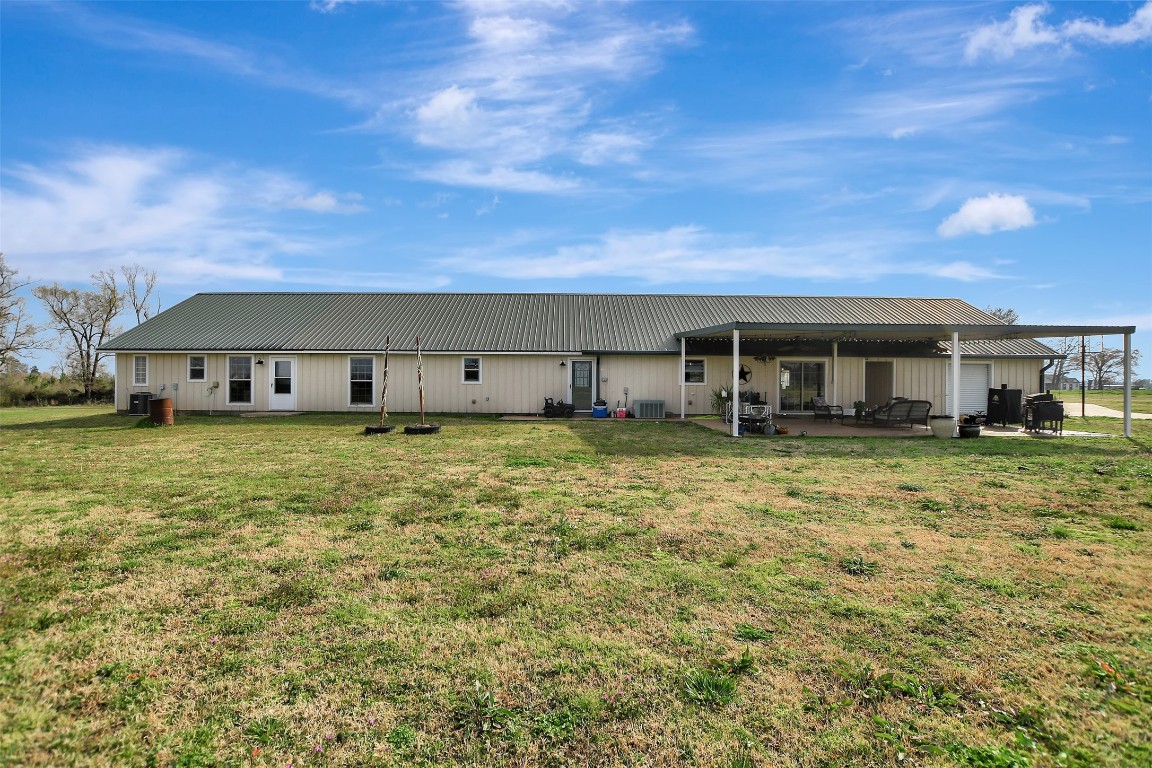 599 County Road 295 Garrison, TX 75946 - Photo 35 of 50 a front view of a house with a yard