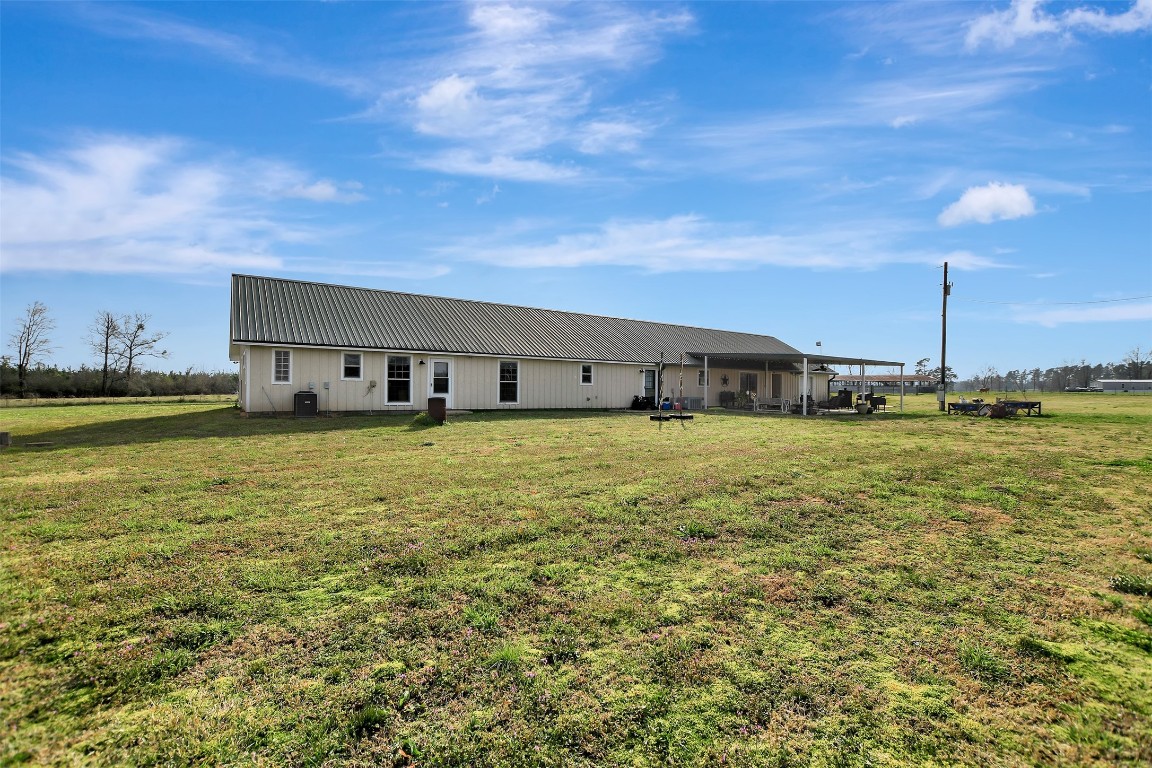 599 County Road 295 Garrison, TX 75946 - Photo 37 of 50 a front view of a house with a yard